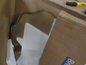 Metal framed mirror measures 3 feet across