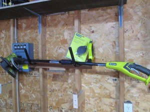 Ryobi cordless 18v weed eater with replacement trimmer attachment (no battery or charger)