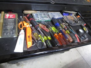 Variety of screwdrivers and assorted bits