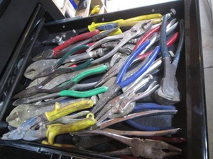 Collection of vise grips, assorted pliers and snips