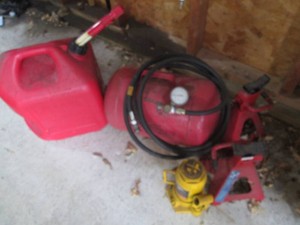 12-ton bottle jack, 2-ton jack stands, portable air tank and 5-gallon gas can