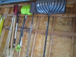 Post hole digger, rake, broom and shovel variety