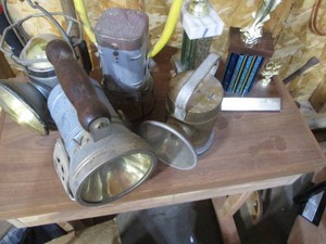 Vintage lanterns and fishing trophies
