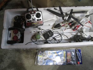 various remote control helicopters and flying model rocket unknown if all complete