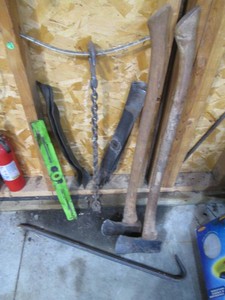 Pry bar, axes, lawn mower blades and misc chain