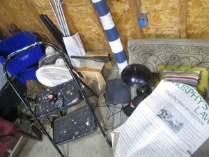 Misc rugs, seat cushion, animal tie-out station, beach mat, personal fans, duffle bag, step stool, vintage wrenching shovel and other misc shown