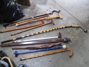 Carved wood walking canes and other walking aids