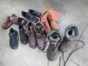 Mens Rocky hunting boots, Caterpillar steel toes, cowboy style work boots and other footwear ranging in sizes from 11.5-14