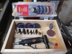 Pneumatic rotary tool with accessories in wood case
