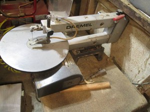 Dremel scroll saw with misc replacement blades