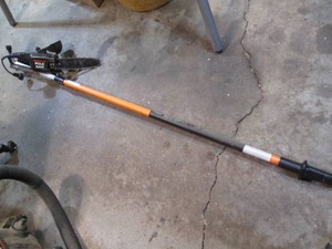 Remington electric pole saw with extending handle