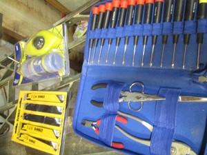 Precision screwdriver set, chalk lining tools and sawzall blades