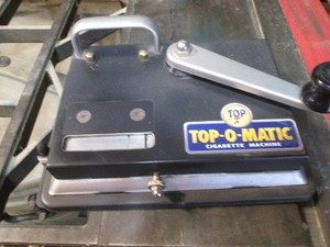 Top-O-Matic manually operated cigarette rolling machine