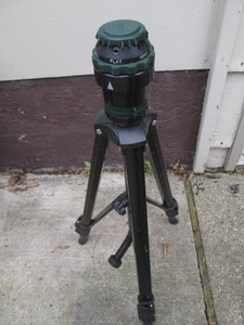 Tripod style lawn sprinkler