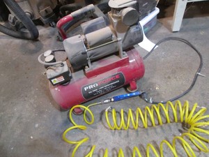Proforce oil free 3-gallon hotdog air compressor with coiled hose