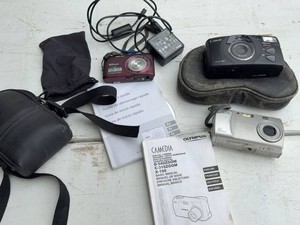 Lot of Canon Nikon Olympus Point & Shoot Cameras w Cases Manuals