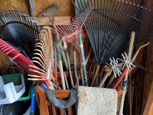 Group of Assorted Yard Garden Hand Tools Rakes Cultivators Hoes