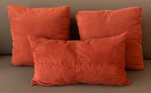LR - Trio of Orange Square & Lumbar Pillows
