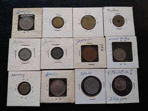 (12) Vintage Foreign Coins in Flips