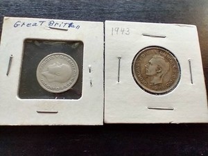 (2) Vintage Foreign Silver Coins