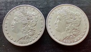 (2) 1880-O Morgan Dollars