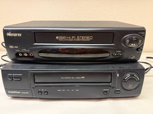 Two VHS VCR PlayerRecorders