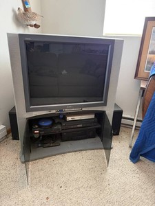 Sony TV & Entertainment Center, Playstation 2 with Games, RCA 5 Disc Player, RCA Home Theater Receiver & Speakers