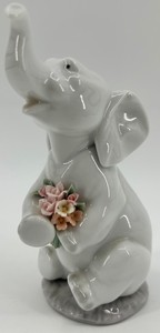 Lladro Porcelain Elephant Figurine With Floral Bouquet - 5 Inches