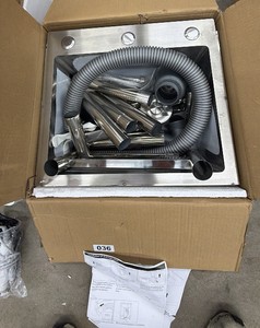New - a freestanding utility sink, the kind with a stainless steel basin on a four-legged frame (common for garages, laundry rooms, or workshops).