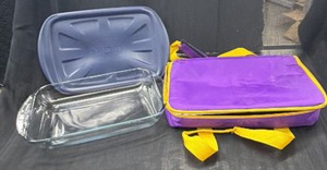 Brand New - This is an Anchor Hocking glass baking dish with a blue plastic lid, plus what looks like a purple and yellow insulated carrier bag for taking it to potlucks or events.