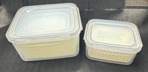 Brand New -These are produce keeper food storage containers with built-in colanders, shown here as two nested sets (a large and a medium stack).