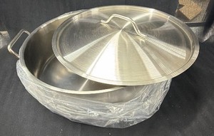 Brand New - This is a stainless steel brazier (a wide, shallow braising pan) with a matching lid. The style is typical of commercial restaurant cookware.
