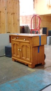 wooden cabinet with marble top