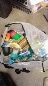 bag of cups, mugs, and water bottles