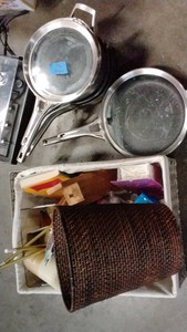 assorted basket, pots, pans with covers