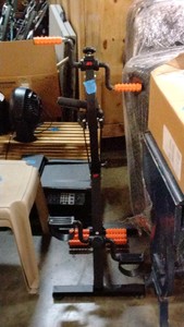 black and orange portable stationary bike