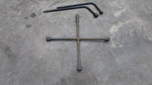 (1) 4Way Tool and (2) Tire Irons