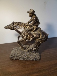Cowboy riding Horse Statue Dcor