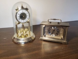 Concordia Clock with glass cover and Linder table clock