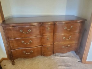 Vintage French Provincial or French Country Style Wooden double Sperpentine Triple Dresser with Nine Dovetail drawers and ornate brass hardware