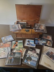 Kenney Chesney Brad Pisley and Many Many more CDs a lot Unopened with Bamboo Box