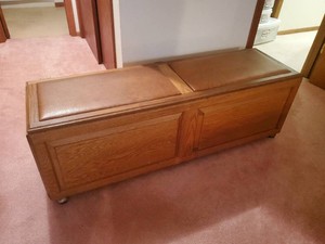 Long Solid Wooden Stroage Chest or Blanket Box with cusioned Top and Assortment of blankets