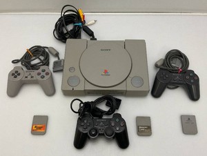 Vintage Playstation One With Three Controllers