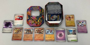 Misc. Unsorted POKEMON Cards In Pokemon Tin