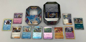 Misc. Unsorted POKEMON Cards In Pokemon Tin