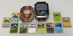 Misc. Unsorted POKEMON Cards In Pokemon Tin