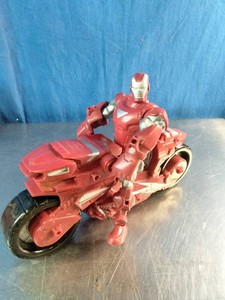Hasbro Marvel Super Hero Mashers Silver Centurion Iron Man action figure with its red Hotshot Hot Rod motorcycle
