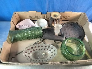 An assortment of vintage and collectible housewares, glassware, and decorative noveltie
