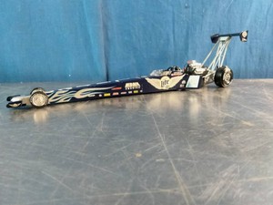 Die-cast model of the 1999 Larry Dixon Miller Lite Harley-Davidson Top Fuel Dragster,