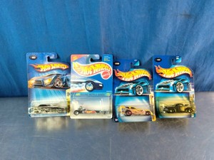 Four assorted 164 scale Hot Wheels diecast vehicles